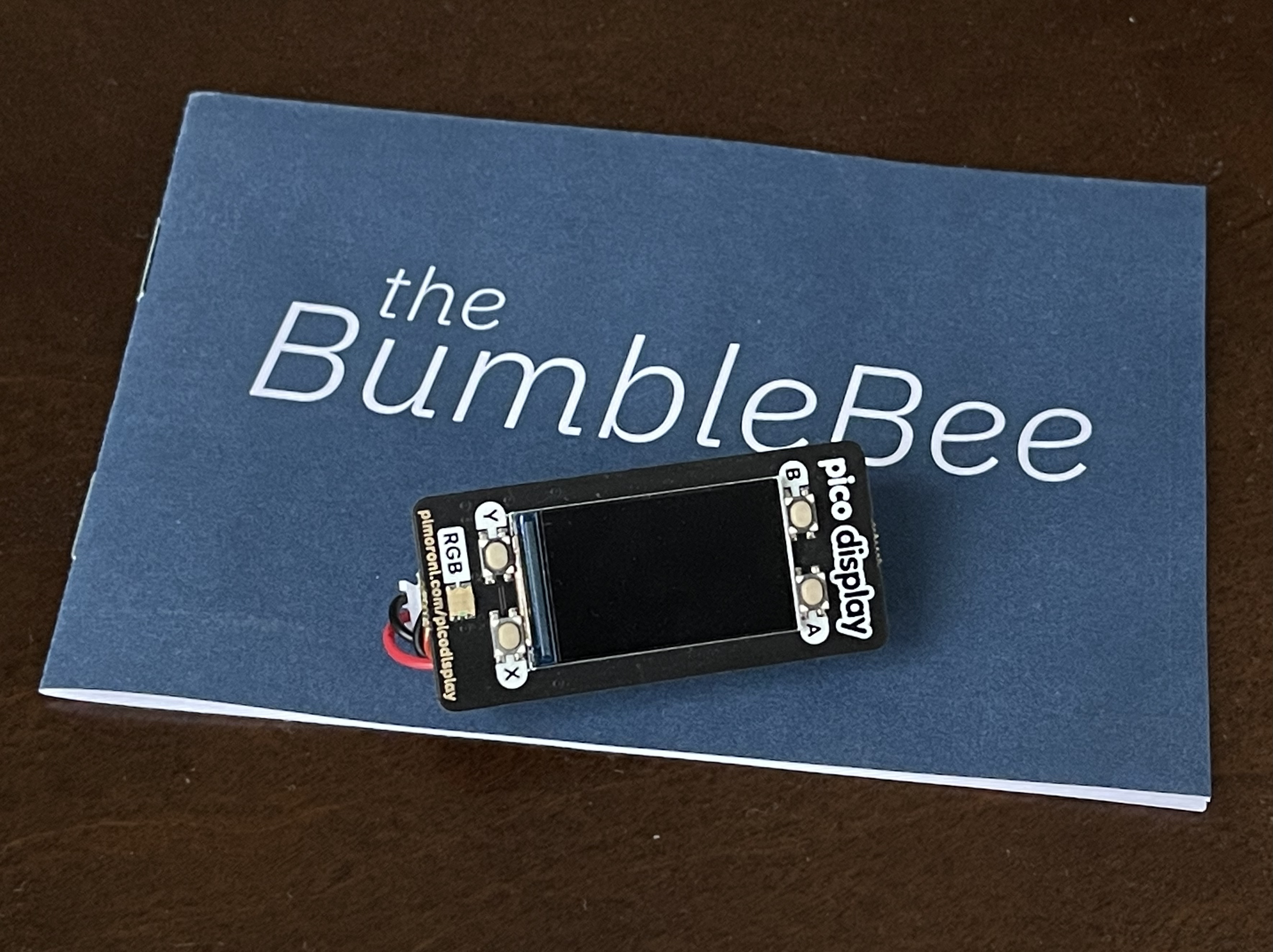 The BumbleBee sitting on its manual