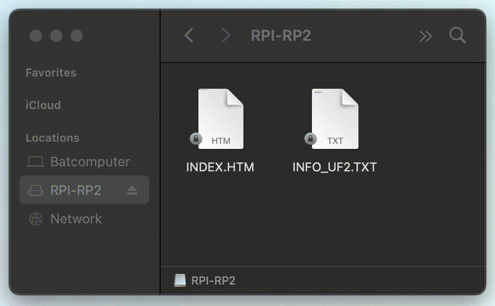 A gif of a CircuitPython uf2 file being dragged-and-dropped into the RPI-RP2 drive